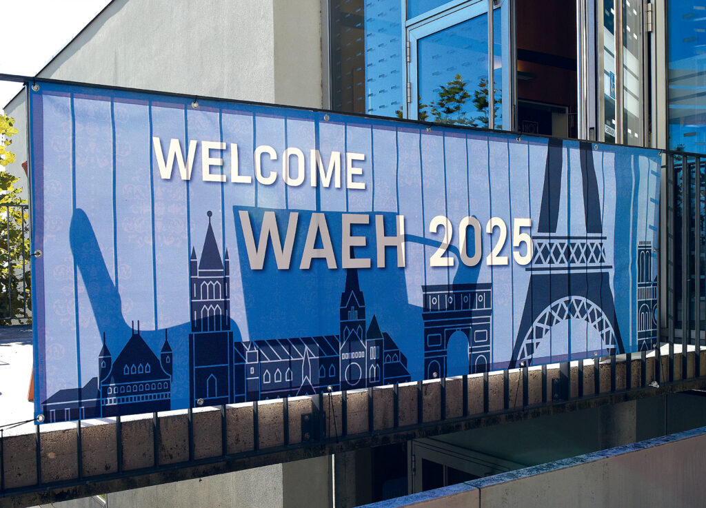 Photo d'une banderole "Welcome WAEH 2025"